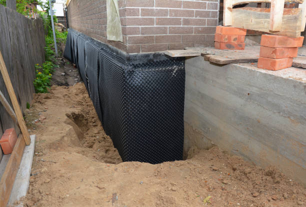 Happy homeowners after waterproofing job in Bloomfield